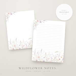 May include: Two sheets of stationery featuring a watercolour wildflower border in soft shades of pink, purple, and green. One sheet is blank, and the other has horizontal lines. A circular badge in the corner reads INSTANTLY PRINTABLE PDF + JPEG.