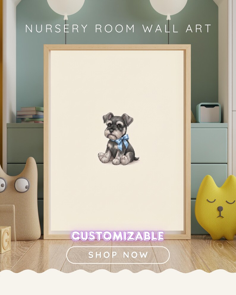 May include: A rectangular wooden frame containing a cream-colored print of a small, seated black and gray puppy wearing a light blue bow around its neck. The text NURSERY ROOM WALL ART appears at the top, with CUSTOMIZABLE and SHOP NOW below.