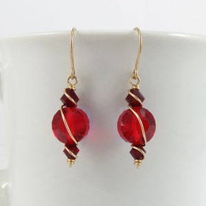 red and gold swarovski earrings