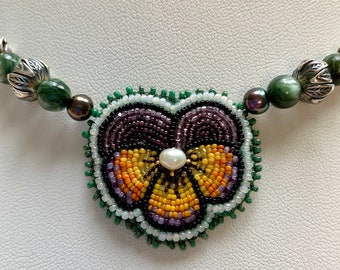 beaded pansy necklace by Nome May micro bead embroidery, purple and orange with pearls and seraphinite