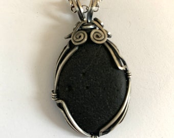 wire wrapped oregon coast pebble necklace pendant