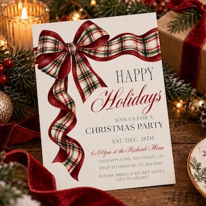 May include: A rectangular holiday party invitation card featuring a large, watercolour-style red, green, and white plaid ribbon tied in a bow. The text reads: HAPPY Holidays, JOIN US FOR A CHRISTMAS PARTY, SAT. DEC. 18TH, 6:00pm at the Richards Home, 734 HAPPY LANE, SAN DIEGO, CA, RSVP TO HANNAH: 123.456.7890, PLEASE BRING A SECRET SANTA GIFT TO SHARE!