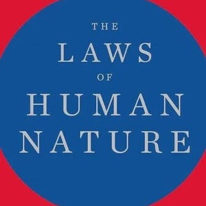 May include: The book cover for The Laws of Human Nature by Robert Greene features a large blue circle centered on a red background. The title is printed in white capital letters, with the author's name and book series text at the top and bottom.