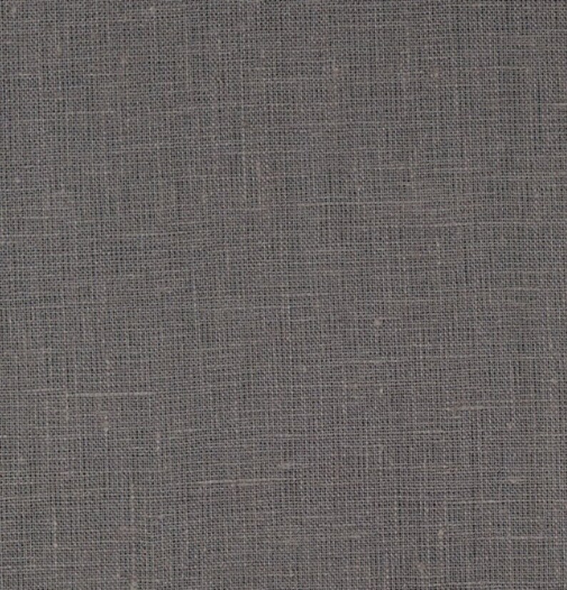 May include: A close-up of a gray woven fabric with a subtle texture. The fabric has a slightly rough feel and a natural, rustic look.