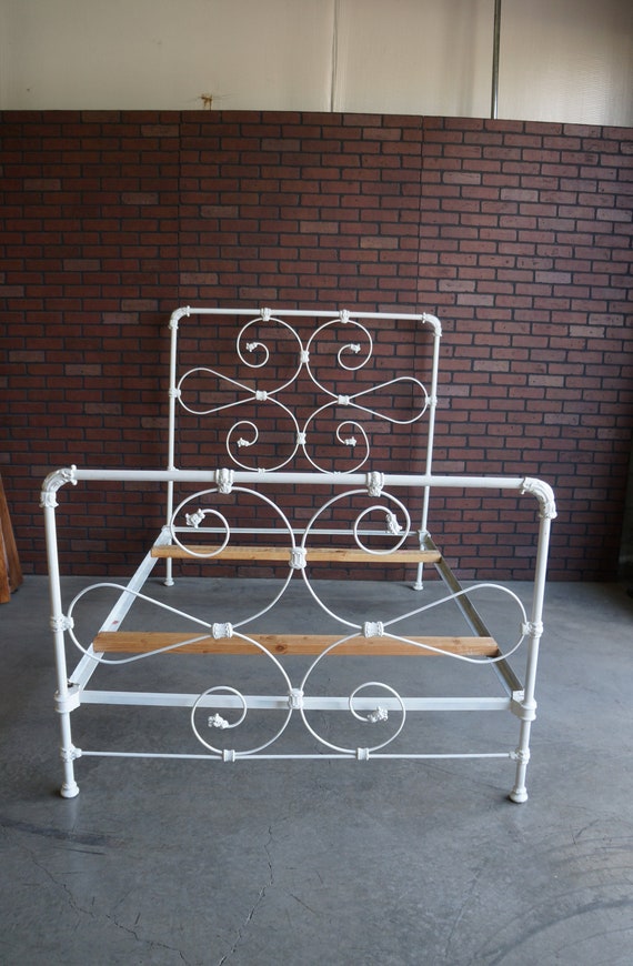 Antique steel 2024 bed frame