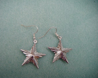 plastic silver glitter star earrings