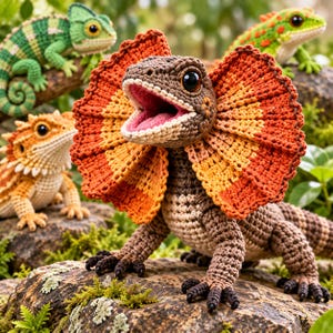 May include: A collection of four crocheted lizard figures including a brown frilled-neck lizard with an open mouth, a green chameleon with a curled tail, a spiky orange bearded dragon, and a green lizard with orange spots, all featuring dark eyes.