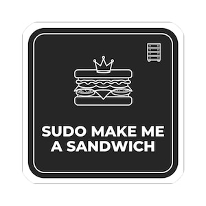 May include: A square black sticker with rounded corners featuring a white line-art graphic of a sandwich topped with a crown, a small chest of drawers icon, and the white text "SUDO MAKE ME A SANDWICH" centered at the bottom of the design.