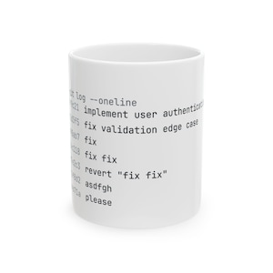 May include: A white ceramic mug featuring black printed text that mimics a git log command line interface. The text includes lines such as git log --oneline, implement user authentication, fix validation edge case, fix, fix fix, revert fix fix, asdfgh, and please.