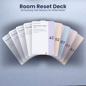 May include: A Room Reset Deck of 60 cleaning task-starter cards for ADHD adults. The cards are fanned out, displaying various pastel colors and numbers. The central card is titled Fresh Sheets Tonight, with instructions to strip the bed and put on clean sheets. Other visible cards show tasks like Press Play, Dust On, Vacuum, and Ten-Item Clutter.