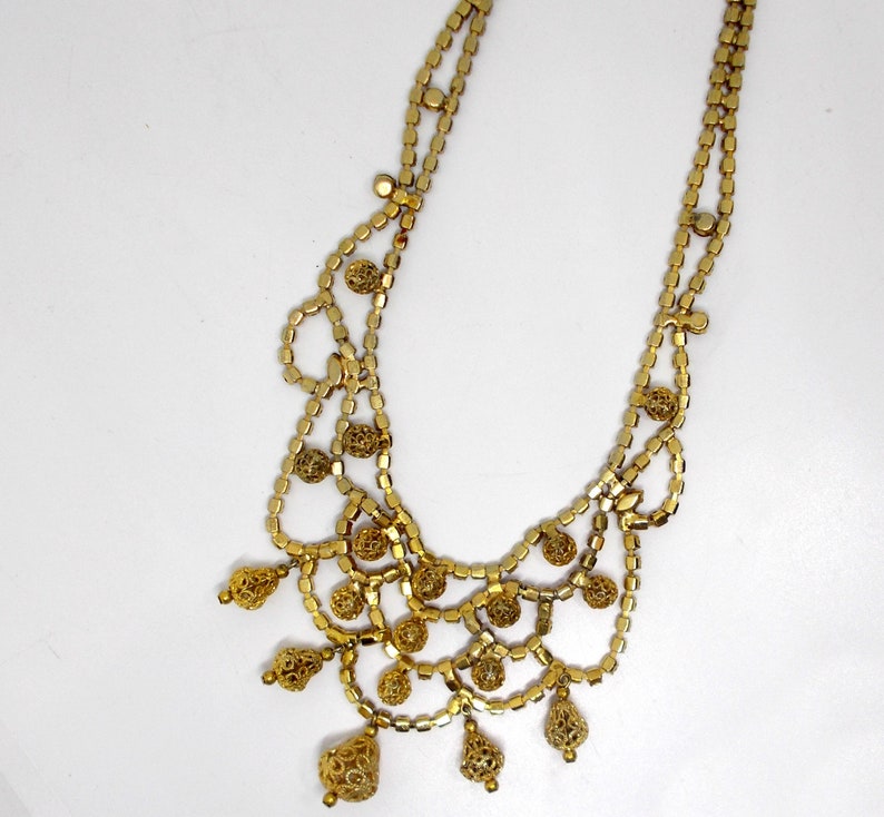 Vintage Gold Tone Filigree Bib Necklace with Dangles /& Ruby Red Rhinestones