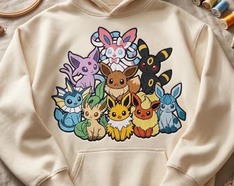 Disegno per ricamo della famiglia Eevee, tutte e 9 le evoluzioni di Eevee in un unico file per ricamo a macchina, design per felpa con cappuccio Umbreon Sylveon Espeon PES DST JEF 3 taglie