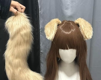 May include: A long, straight brown wig with a fringe styled on a mannequin head, featuring two attached beige faux fur animal ears. A separate, matching long beige faux fur animal tail is displayed alongside the wig set.