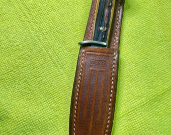 Raro cuchillo de caza Case XX USA de 1965-80 con mango de hueso de asta y funda.