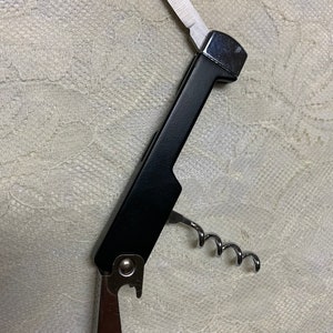 2020 Case Zippo Bradford,Pa.USA black handle Bartenders knife 4 5/8” overall