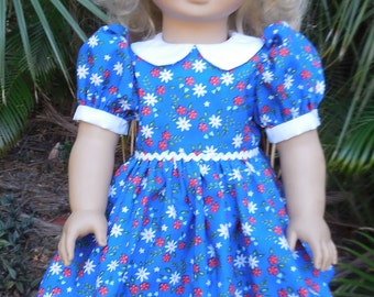 Blue dress with red and white flowers made to fit American Girl and similar 18 inch dolls.