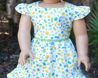 Summer, cotton dress, white with blue and green design, made for American Girl and similar 18 inch dolls.