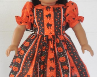 Oranje en zwarte jurk gemaakt voor American Girl