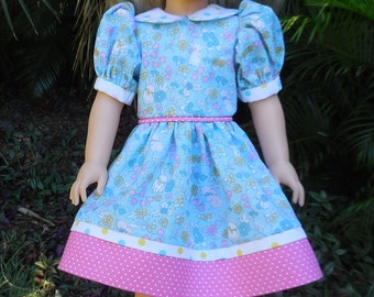 Easter dress with flowers and bunnies made for Wellie Wishers and similar 14 inch dolls