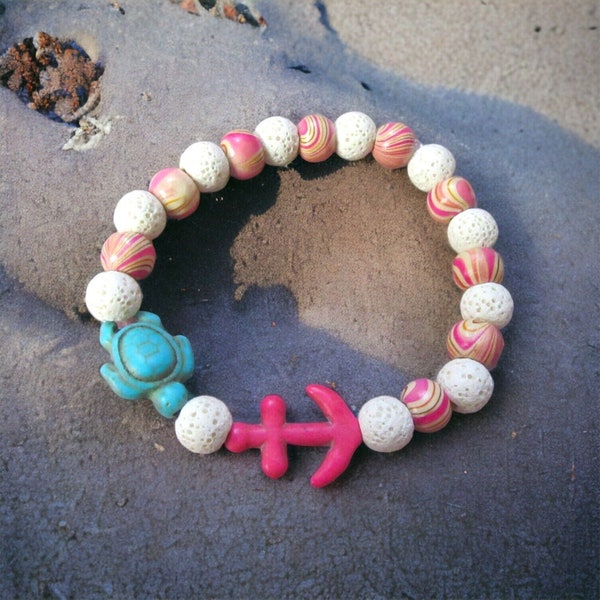 Ocean Vibes: Sea Turtle Stretch Bracelet with Hot Pink Anchor Accent Bead