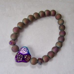 Vibrant Multicolor Skull Bracelet: Textured Beads Add a Unique Twist