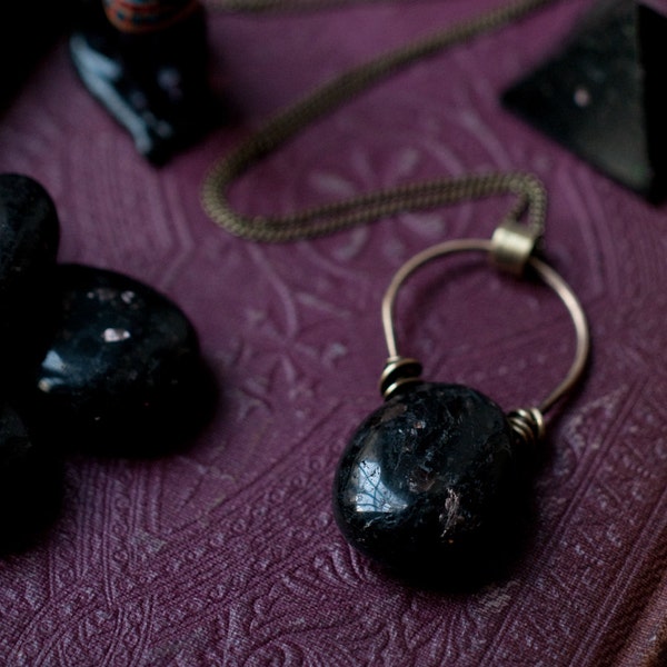 Nuummite pendant necklace, wire wrapped tumbled stone, oxidised antiqued brass, long necklace, magickal talisman, sorcerers stone.