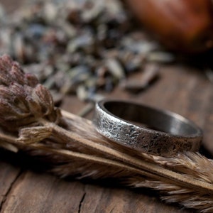 Rustic wedding ring, sterling silver or gold wide band textured against stone and oxidised, 5mm wide, gender neutral for him, her or they.