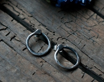 Silver Ouroboros snake stud earrings, an alchemical symbol for infinity and the cycle of life