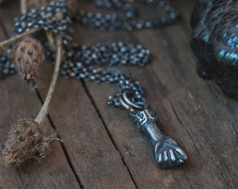 Figa fist in antiqued sterling silver, the mano fico pendant is a good luck symbol, evil eye charm, and protection amulet.