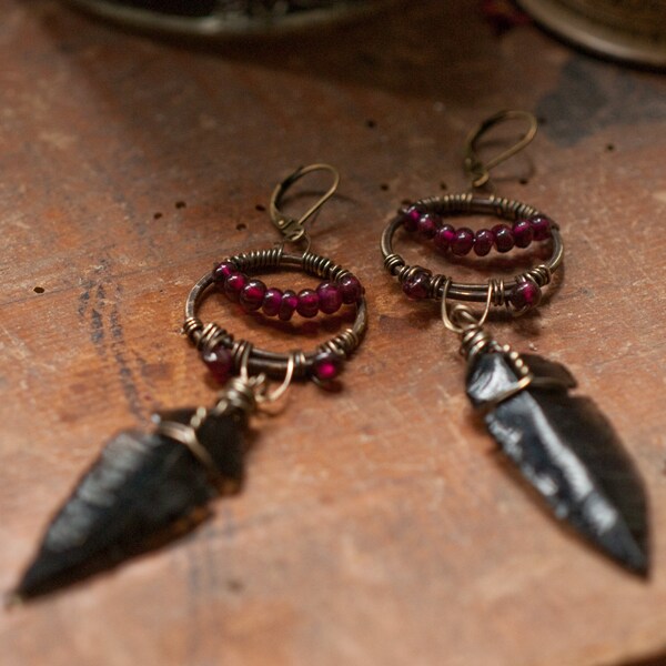 RESERVED for NM Obsidian arrowhead + garnet statement earrings, wire wrapped warrior jewelry, oxidised brass, black + gold shoulder dusters