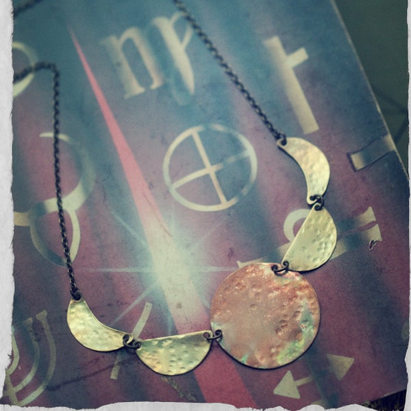 Moon phase necklace, lunar cycle, mixed metal, copper and brass, hammered and fire oxidised for a rainbow patina.