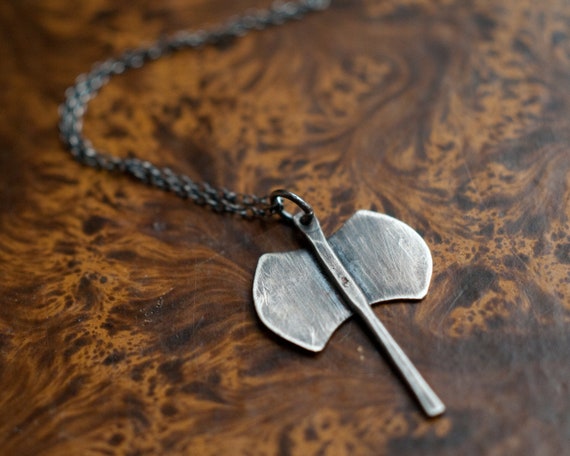 Labrys necklace, a double headed axe amulet in sterling silver, to honour the Mother and lunar Goddesses, a female strength talisman.