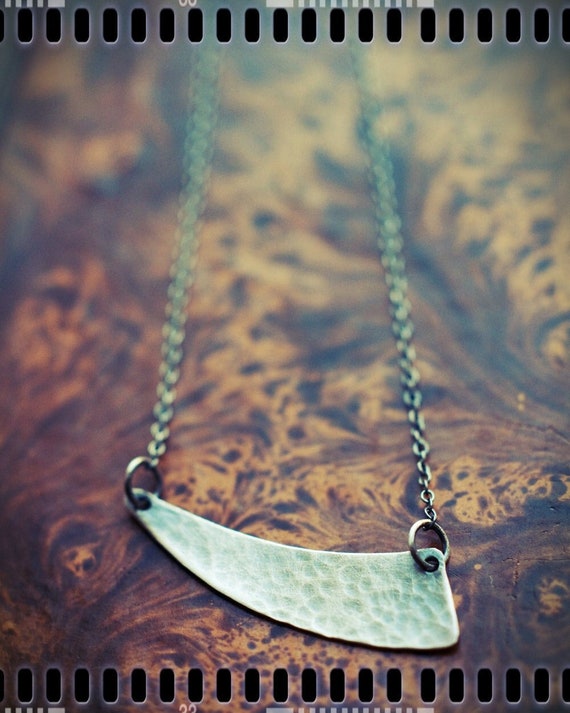 Miniature sterling silver Scythe charm necklace, a harvest time and Lammas amulet,  asymmetric necklace with a geometric design.