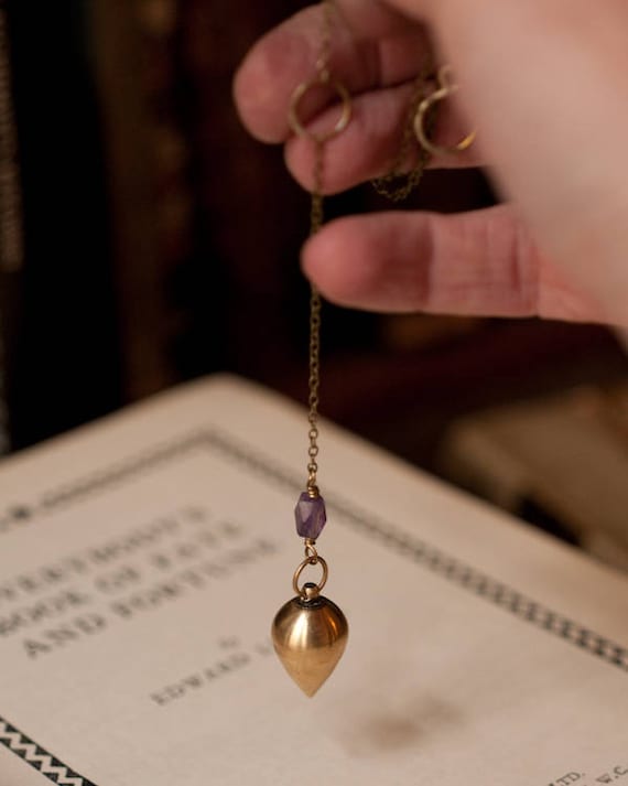 Brass pendulum necklace with amethyst, a clairvoyance and divination tool for intuition and fortune telling magick