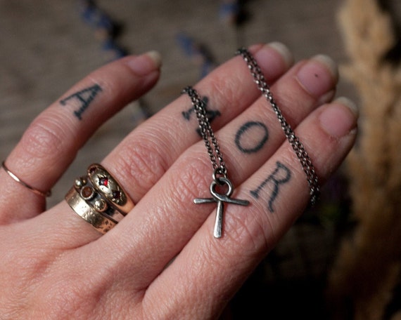 Ankh pendant in oxidised and antiqued sterling silver, an ancient Egyptian amulet for good luck and long life, also available in gold.