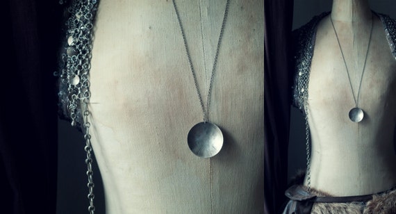 The DISC necklace, a geometric minimalist sterling silver circle pendant with sun ray design for my KREIS collection.