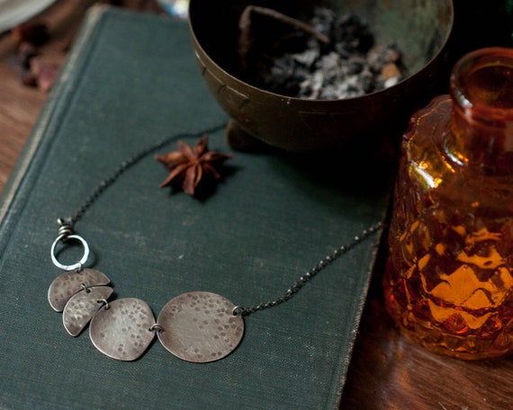 Moon phase necklace in hammered sterling silver, oxidised or polished. A necklace for lunar worshippers and witchy folk of all genders