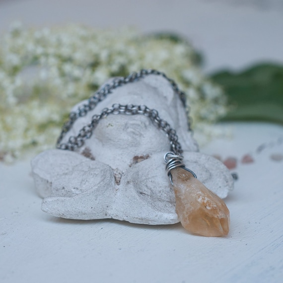 Rough citrine pendant necklace, a sterling silver wire wrapped crystal point amulet for creativity and abundance.