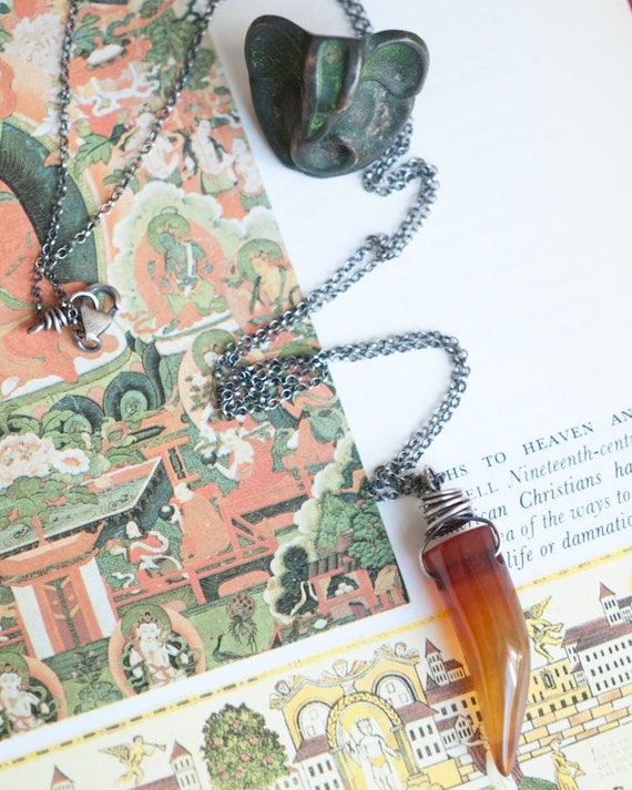 Wire wrapped tusk necklace, Carnelian agate in sterling silver, in honour of Ganesha, mental strength and confidence talisman.