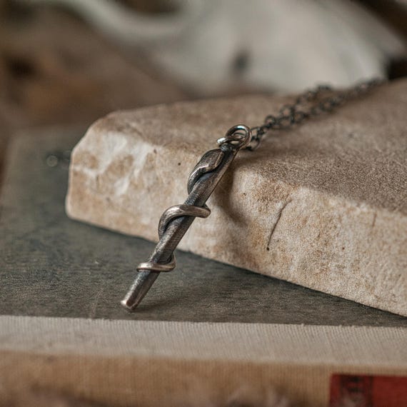 Sterling silver rod of Asclepius necklace, a talisman for healing and transformation.