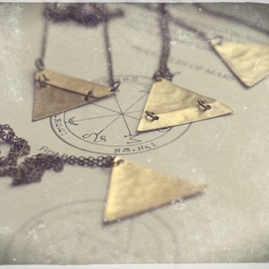 Elemental Alchemy necklace talisman for Earth, Air, Fire and Water... hand cut and hammered from sheet brass.