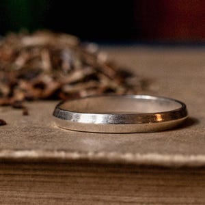Alternative wedding ring, a silver triangular geometric band as a stacking ring or slim wedding band, gender neutral for everyone's fingers