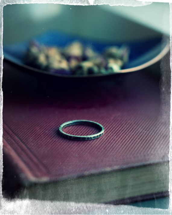 Sterling silver hammered stacking ring, a simple skinny 925 silver band, hammered and oxidised for a rustic, industrial look.