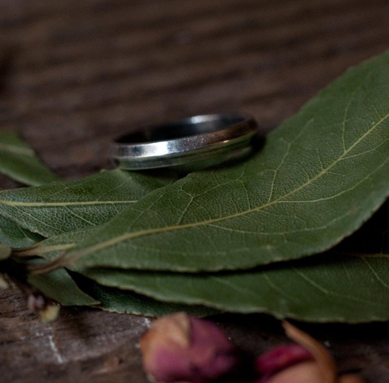 Soft knife edge ring bands in buttery gold or steel grey silver