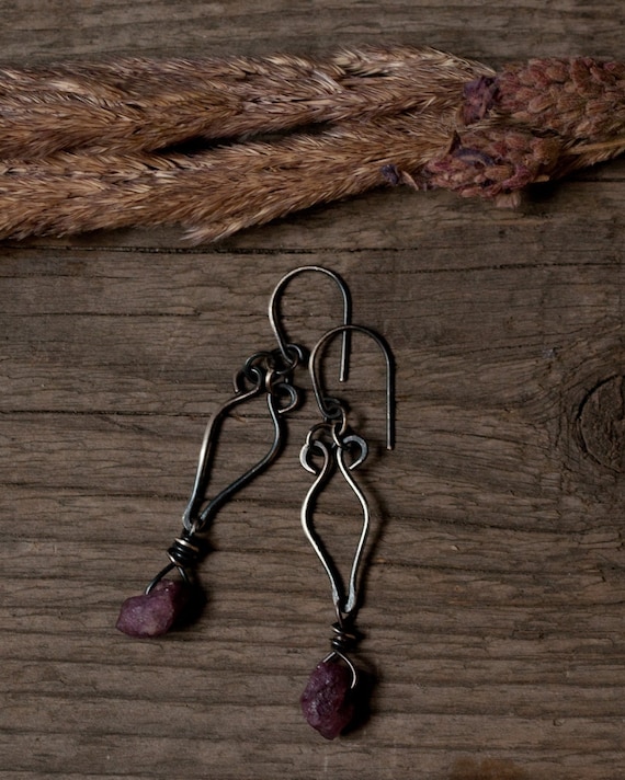 Silver and rough ruby dangle earrings in oxidised sterling silver. Wire wrapped gemstone earrings  for protection and courage.