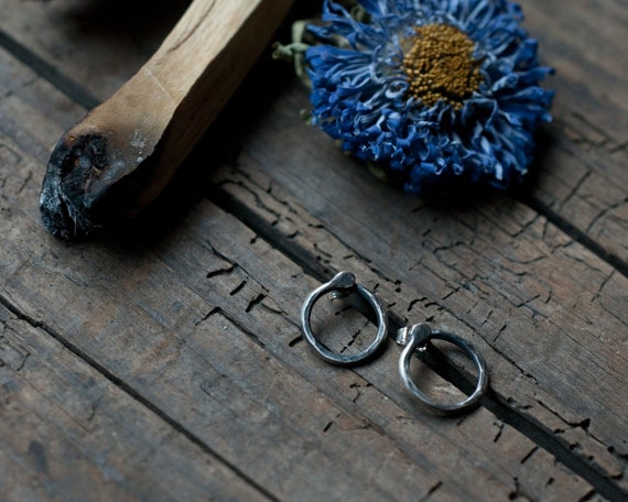 Silver Ouroboros snake stud earrings, an alchemical symbol for infinity and the cycle of life