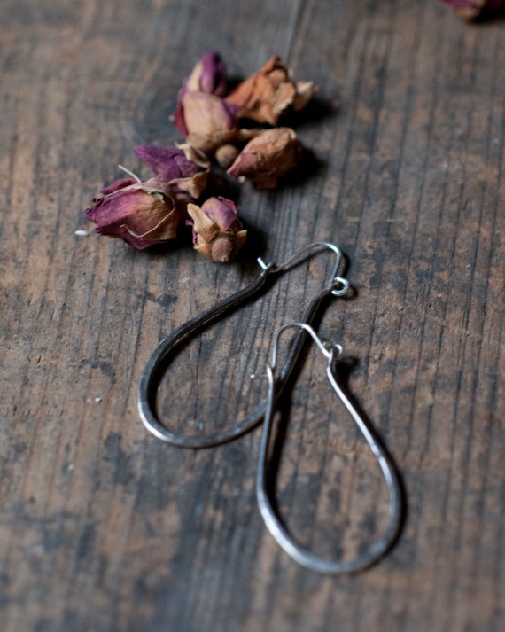 Sterling silver elongated oval hoop earrings, hammered and oxidised with a rustic patina