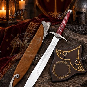 May include: A silver-toned metal sword with a red textured handle featuring white vine-like patterns, accompanied by a brown scabbard with silver metal accents and a dark wooden wall plaque engraved with circular elvish script and gold trim.