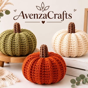 May include: Three crocheted pumpkins in olive green, cream, and burnt orange, each featuring a brown stem. The text AvenzaCrafts is displayed above the pumpkins, and a framed sign to the right reads PUMPKIN SPICE & COZY VIBES with a pumpkin icon.