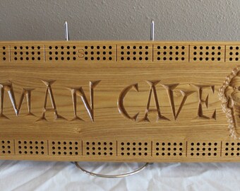 Man Cave cribbage board with 3d carved beer mugs made from Black Ash